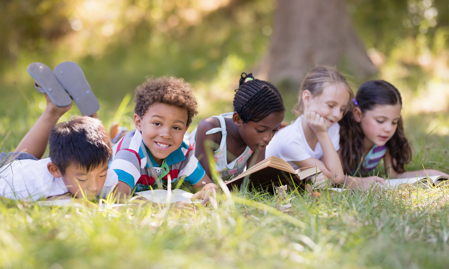 children-outside-reading.jpeg