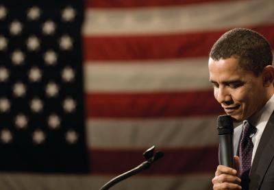 Barack Obama with US flag in the background