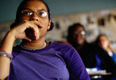 A girl listens to instruction