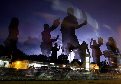 protesters march in Ferguson, MO after Michael Brown was fatally shot