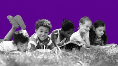 diverse children reading outside