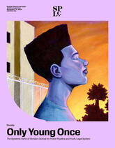 Profile of a Black youth in front of barbed wire fence